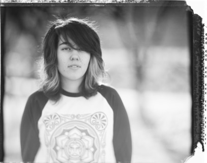 Mixed race woman standing outdoors