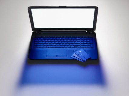Credit cards on laptop computer