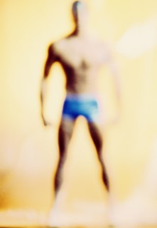 Defocused man standing in underwear