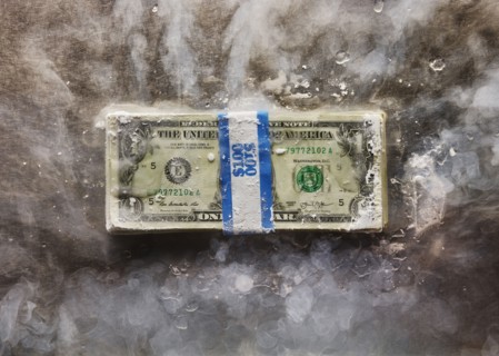 Frozen bundle of dollar bills