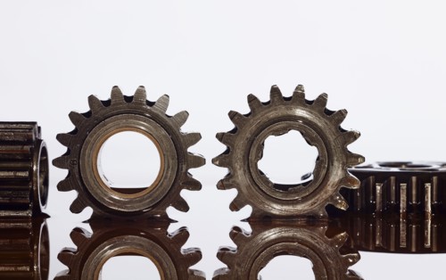 Gears in puddle of oil