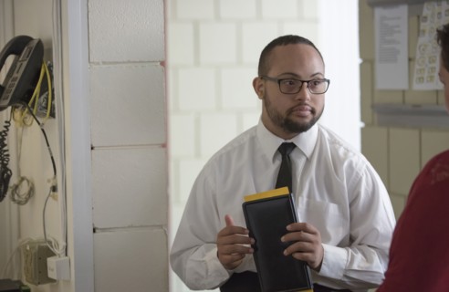 Mixed race server working in restaurant