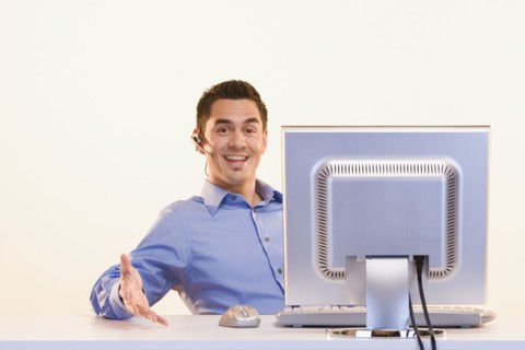 Portrait of businessman at computer
