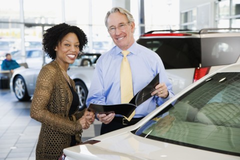 Woman buying a car