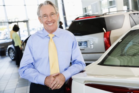 Car salesman smiling