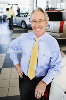 Car salesman smiling