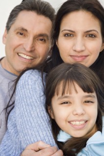 Close up of Hispanic family smiling