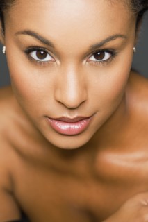 Close up of Hispanic woman with bare shoulders