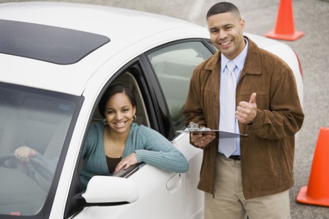 African teenager taking drivers test
