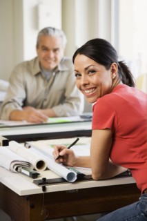 Hispanic female architect at desk
