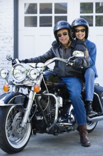 Senior African American couple on motorcycle