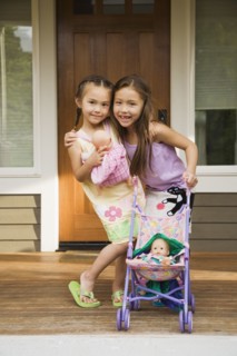 Asian sisters hugging