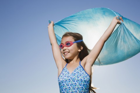 Asian girl in bathing suit with scarf