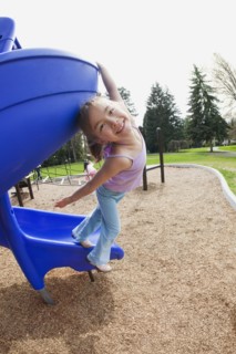 Mixed race girl at playground