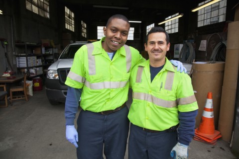 Sanitation workers in garage