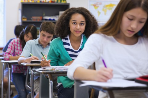 Students taking notes in class