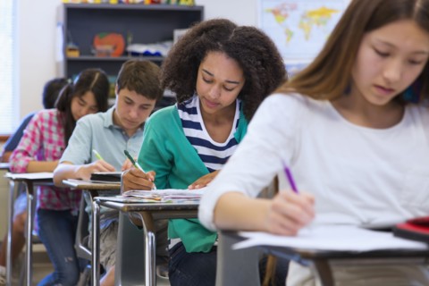 Students taking notes in class
