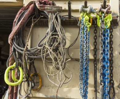 Chains and cords hanging on hooks