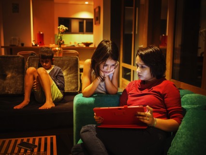 Family relaxing together in living room