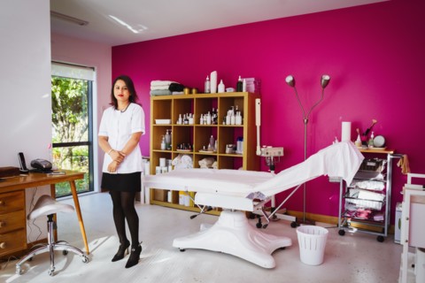 Mixed race technician working in home beauty parlor