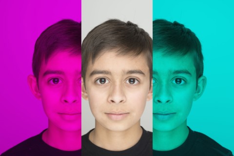 Mixed race boy in color shift