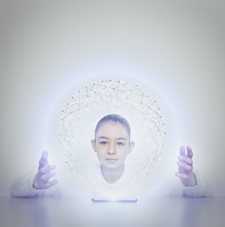 Mixed race girl holding sphere from digital tablet