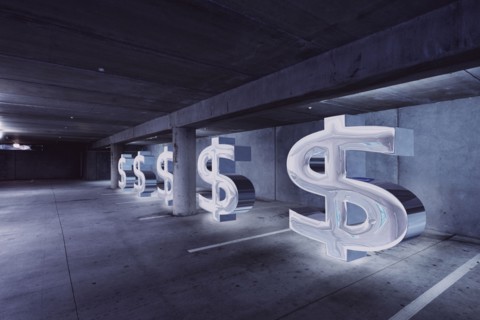 Dollar signs in parking lot