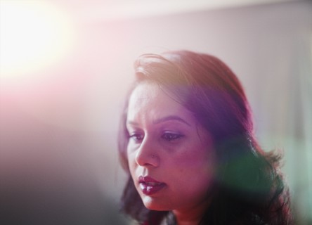 Mixed race woman looking down