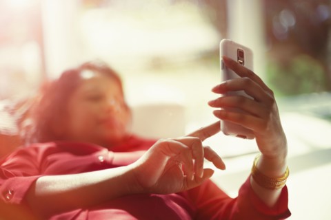 Indian woman using cell phone