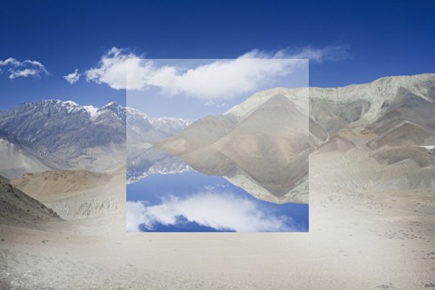 Pixelated upside-down image of mountain range