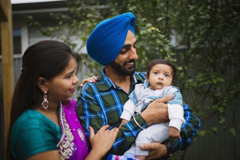Couple admiring baby son