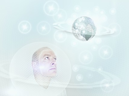 Caucasian man looking at globe in cyberspace