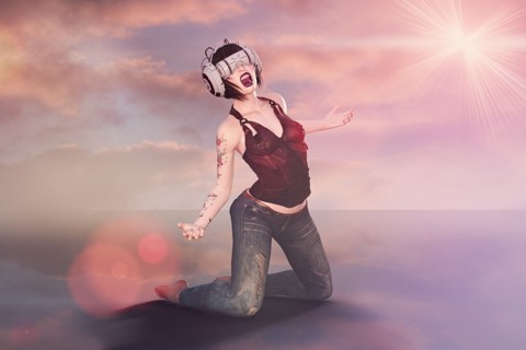Kneeling woman wearing virtual reality helmet screaming