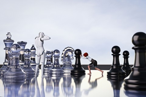 Frustrated robot watching girl playing chess with large pieces