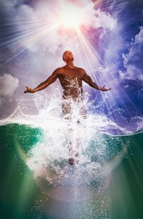 Naked man rising from ocean