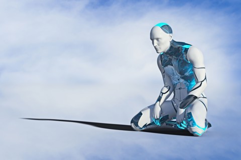 Robot man kneeling on ground