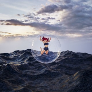 Woman floating in bubble over stormy ocean