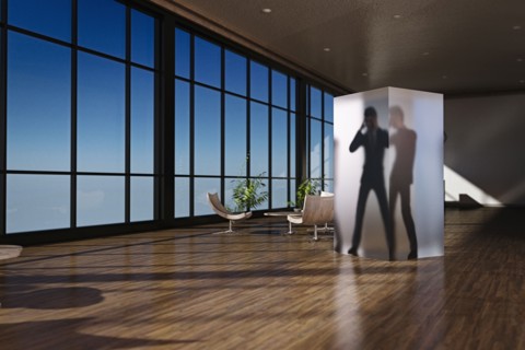 Business man in suspended animation in office