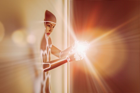 Light glowing in hands of futuristic woman emerging from wall