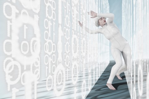 Woman leaning in binary code walls