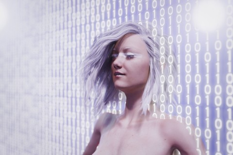 Futuristic woman standing in binary code wall