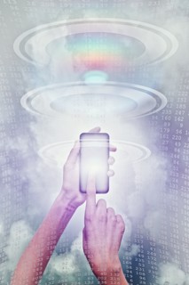 Hands of mixed race boy using cell phone in cyberspace