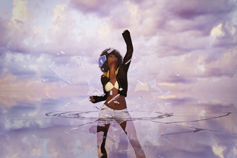 Woman punching through glass ceiling