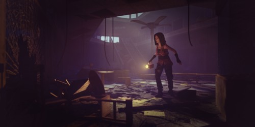 Woman holding flashlight exploring building ruins