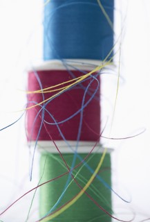 Stacks of spools of multicolor thread
