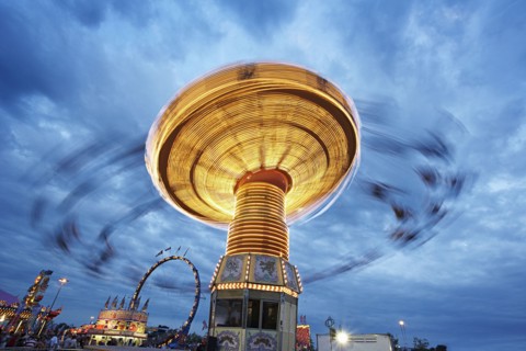 Blurred view of ride at amusement park