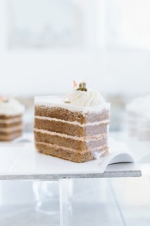 Close up of platter of cake on cafe counter