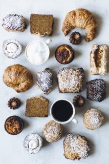 High angle view of variety of pastries and coffee