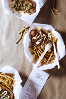 High angle view of chili dog with french fries