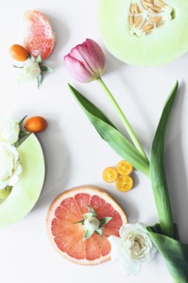 Flowers and sliced fruit
